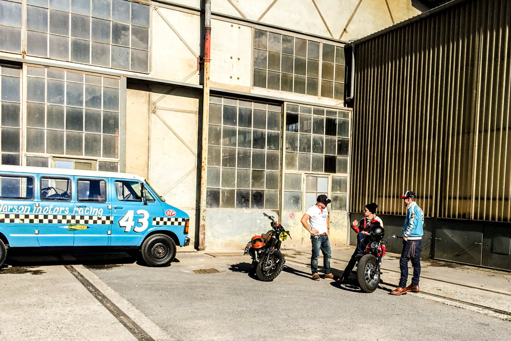 Dodge and motorbikes waiting for the right light